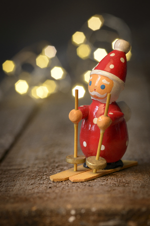 santa claus decoration nostalgic with wooden background with space for textの写真素材