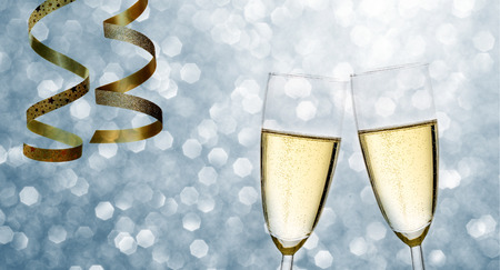 Champagne for the new year on red romantic background with festive bokeh and space for textの写真素材