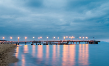 pier at nigt with lightsの写真素材