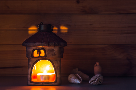 Candle with sea shellsの写真素材