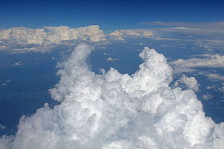 Beautiful white clouds view from plane background wallpaperの写真素材