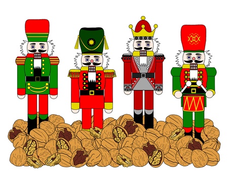 Four different holiday nutcrackers standing in a bed of walnutsの写真素材