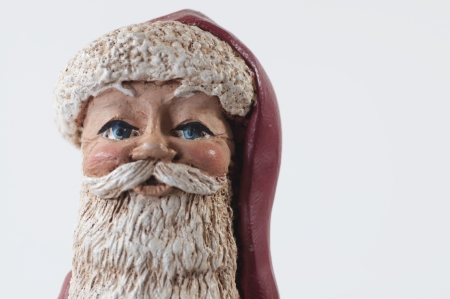 The head of a Santa Claus figure with blue eyesの写真素材