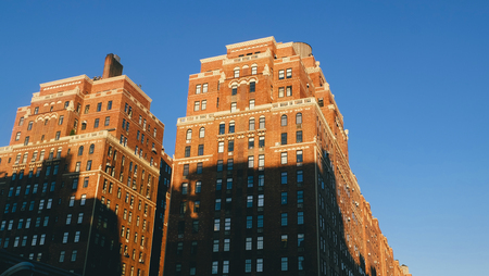 Twin Building with shadow and the clear blue sky background at Chelsea New York.の写真素材