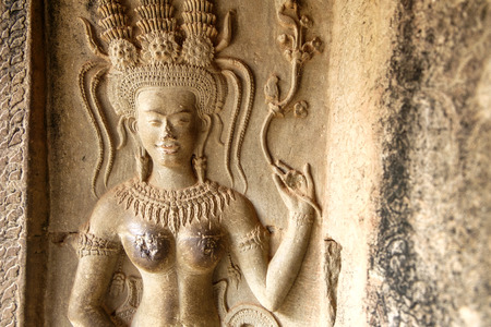 Sandstone sculpture, Close up of Apsara the angel of Cambodia. Angkor Wat, Siem Reap, Cambodia.の写真素材
