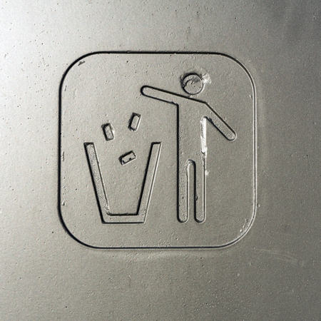 Rubbish sign on metallic backgroundの写真素材