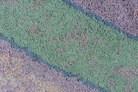 Colorful surface as background - violet, green, blue, diagonal strips. Safety rubber floor mats....