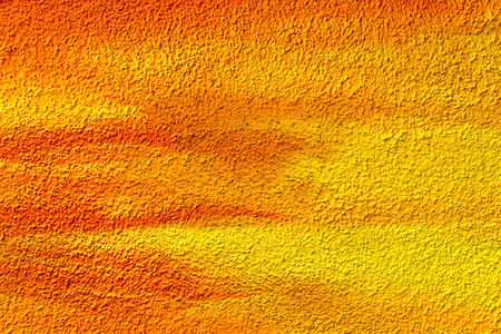 Colorful roughcast texture. Yellow orange background.の写真素材