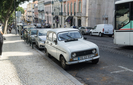 LISBON, PORTUGAL - SEPTEMBER 3, 2018: White Renault 4  car oldtimer  parked on the street if Lisbon.のeditorial素材
