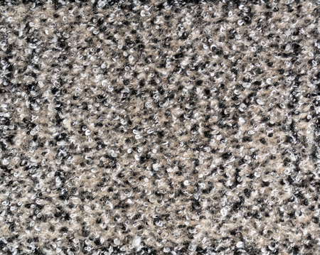 Real beige heather boucle fabric made of wool fibers textured background. Fabric yarn texture.の写真素材