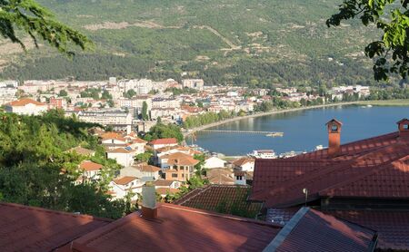 Ohrid and Ohrid Lake on a sunny summer day, view from above from the castle hill, the mountains in the background. Ohrid and Lake Ohrid are Culturalの写真素材