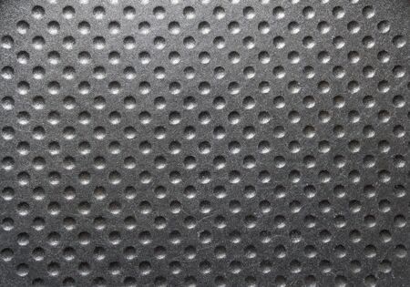 Metallic background with dot pattern.  Industrial, abstract background.の写真素材