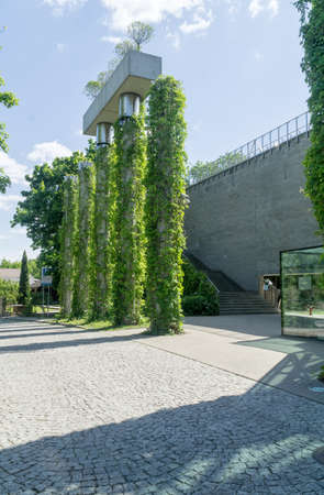BIAÅYSTOK, POLAND - June 02, 2021: Green nature facade of The building of the Opera and Philharmonic in BiaÅystok. Modern architecture, Green city, Vertical garden.のeditorial素材