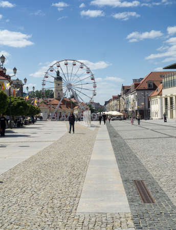 BIALYSTOK, POLAND - June 02, 2021: View on Rynek Kosciuszki, Kosciuszko Main Square with historic Town Hall and ferris wheel on the foreground.のeditorial素材