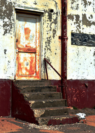 Old warehouse door and stair from abandoned warehouseの写真素材
