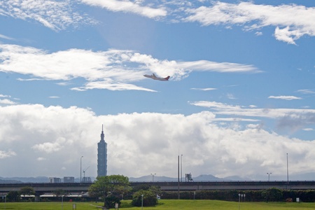 Airplane take off in Taipei, Taiwan;
View of the Songshan Airport;
photographed in November 2011の写真素材