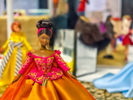 Darmstadt, Germany - September 16th 2020: A german photographer visiting Loop5, the biggest shopping mall in Hesse, taking pictures of an exhibition with different barbie dolls from 30 decades.のeditorial素材