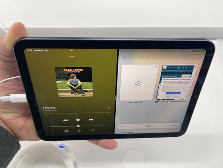 Frankfurt, Germany - October 4th 2021: A German photographer visiting a Saturn market, comparing the different versions of the new iPad Mini.のeditorial素材