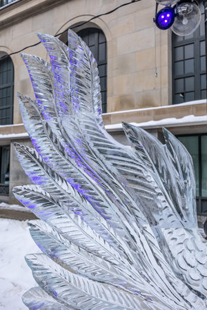 Ottawa, Canada - February 08th 2023: A german photographer discovering the pedestrian zone in downtown Ottawa, viewing ice sculptures of the so called winter lude.のeditorial素材