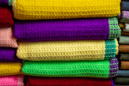 Multi color febric on the street shop on the sea beachの写真素材