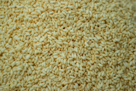 Puffed white rice in a street shop over that also known as muri, porri. Muri is famous savory of...