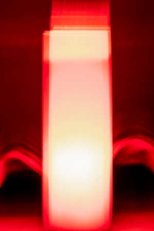 Red white and gradient colors mixed with the lighting effect on home decorの写真素材