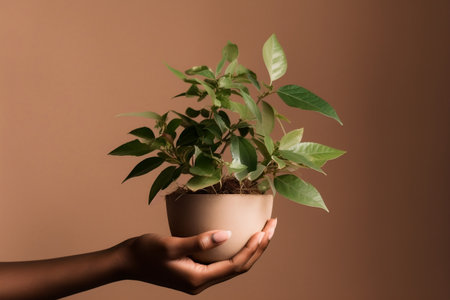 Gentle Hand Cradling a Lush Green Plant. Generative AIの素材