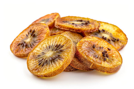 Dried kiwi slices isolated on white backgroundの素材