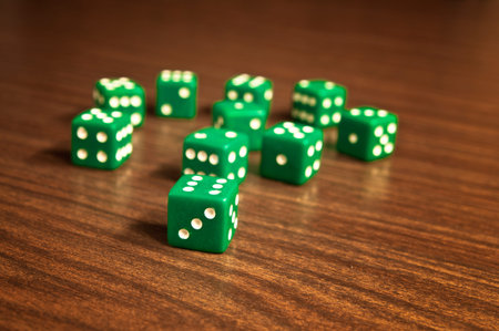 Dices on wooden table - game of chances
