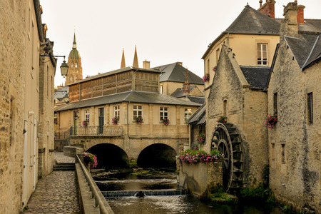 Old water canal in city of Bayeux in Normandy, Franceの写真素材