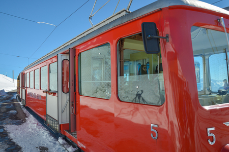 Rigi Kulm, Switzerland - March 6, 2015: Tourists walking inside the cogwheel train at the end station on top of Mount Rigi, Switzerland during March 2015のeditorial素材