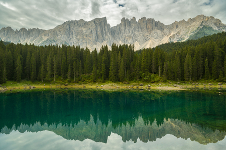 Nice reflection of Dolomites in Lago di Carezza, Italyの写真素材