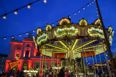 Zurich, Switzerland - December 15, 2018: Children having fun on carousel on traditional christmas market in Zurich, Switzerland in December 2018のeditorial素材