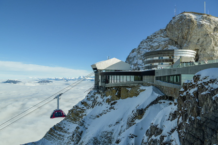 Pilatus, Switzerland - January 1, 2019: Cable car full of tourists approaching top station on Mount Pilatus in Swiss Alps during 1st day of New Year 2019のeditorial素材