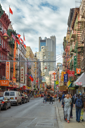 New York City, USA - October 5, 2018: People walking through one of the busy streets in Chinatown district in New York City, USA during October 2018のeditorial素材