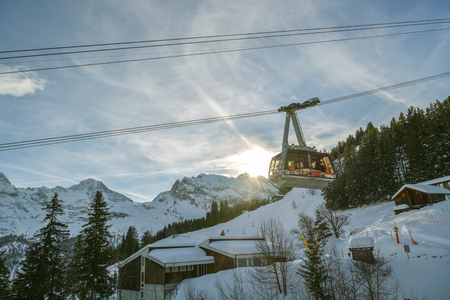 Murren, Switzerland: January 16, 2019: Cable car full of tourists between Murren and Birg in Swiss Alps during winter 2019のeditorial素材