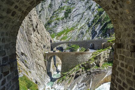 Legendary Devil's Bridge built by devil himself over Schollenen Gorge in Andermatt, Switzerlandの写真素材