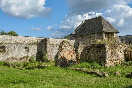 Ruins of old fortified monastery close to small village of Bzovik in southern part of Slovakiaの写真素材