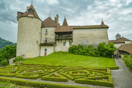 Gruyeres, Switzerland - June 9, 2019: Gruyeres castle on top of the small hill in Gruyeres, Switzerland during June 2019のeditorial素材