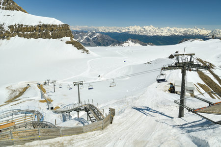 Glacier 3000, Switzerland - June 8, 2019: People riding on the toboggan on top of Glacier 3000, Switzerland during sunny spring day in June 2019のeditorial素材