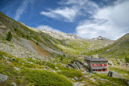 Saas-Almagell, Switzerland - August 17, 2019: Almagelleralp mountain hut above the Saas-Almagell village in Switzerland during beautiful summer hike in August 2019のeditorial素材
