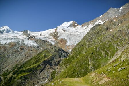 Melting Fee Glacier above the Saas-Fee village deep in the Swiss Alpsの写真素材