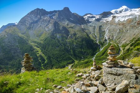 Small rock towers overlooking the Saas valley close to Saas-Fee village, Switzerlandの写真素材