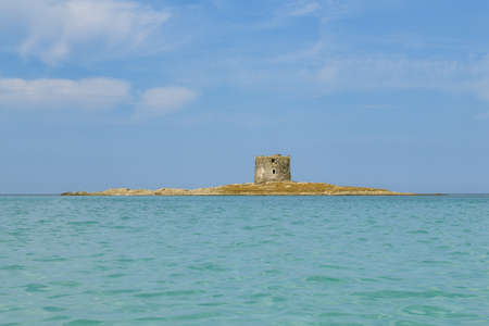 Ancient watchtower close to La Pelosa beach in Stintino in Sardinia, Italyのeditorial素材