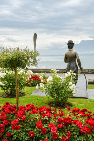 Vevey, Switzerland - June 9, 2019: Statue of Charles Chaplin and Fork of Vevey on the shores of Lake Geneva in Vevey, Switzerland during June 2019のeditorial素材