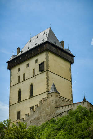 Karlstejn, Czech Republic - June 21, 2019: View on the main tower of Karlstejn Castle in Karlstejn village in Czech Republic during sunny summer day in June 2019のeditorial素材