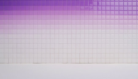 A striking visual composition featuring a wall covered in small, square tiles that exhibit a smooth gradient from vibrant purple at the to pure white at the bottom. The glossy finish of the tiles reflects light, adding depth and shine to the surface. Below the tiled wall is a clean, flat white surface, creating a distinct separation and a minimalist aesthetic. The lighting is bright and even, emphasizing the clean lines and the seamless transition of colors. is as a modern, stylish backdrop...の素材