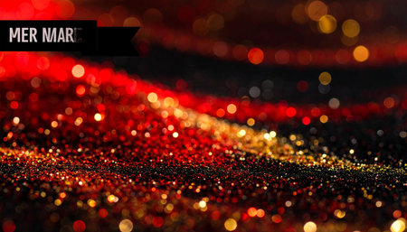 Red and gold glitter bokeh on black background. Christmas backgroundの素材