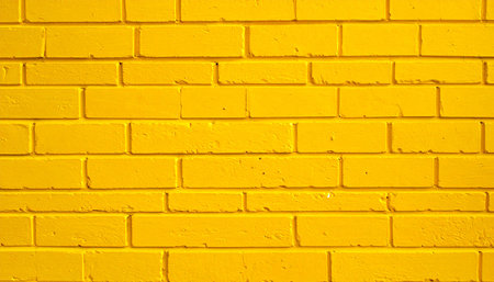 Yellow brick wall texture background. Yellow brick wall texture. Yellow brick wall background.の素材
