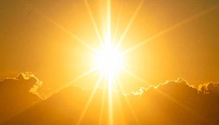 Sunset sky with clouds and sunbeams. Nature background.の素材